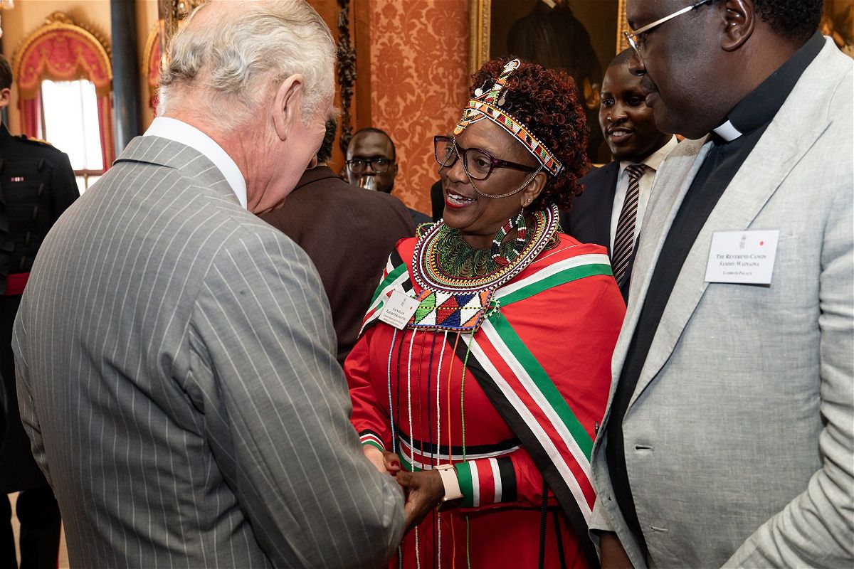 <i>Keystone/Hulton Royals Collection/Getty Images</i><br/>Charles shaking hands with Kenyan president Jomo Kenyatta at his country home at Gatundi