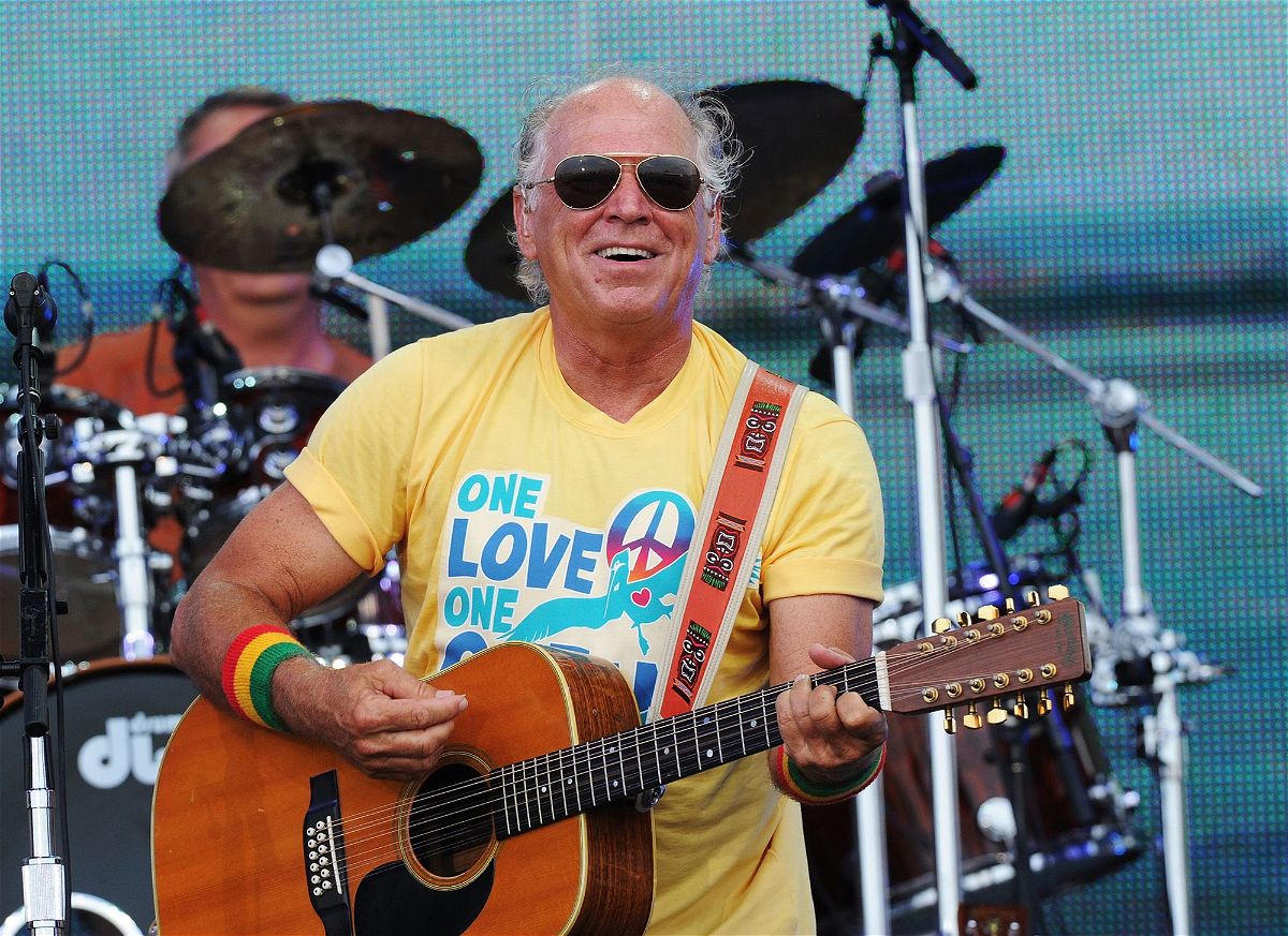<i>Rick Diamond/Getty Images</i><br/>Musician Jimmy Buffett performs at a concert on the beach in 2010 in Gulf Shores