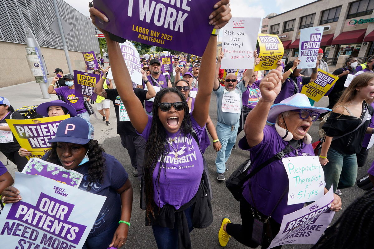 Frontline healthcare workers hold a demonstration on Labor Day 2023 outside Kaiser Permanente Los Angeles Medical Center in Hollywood, California.