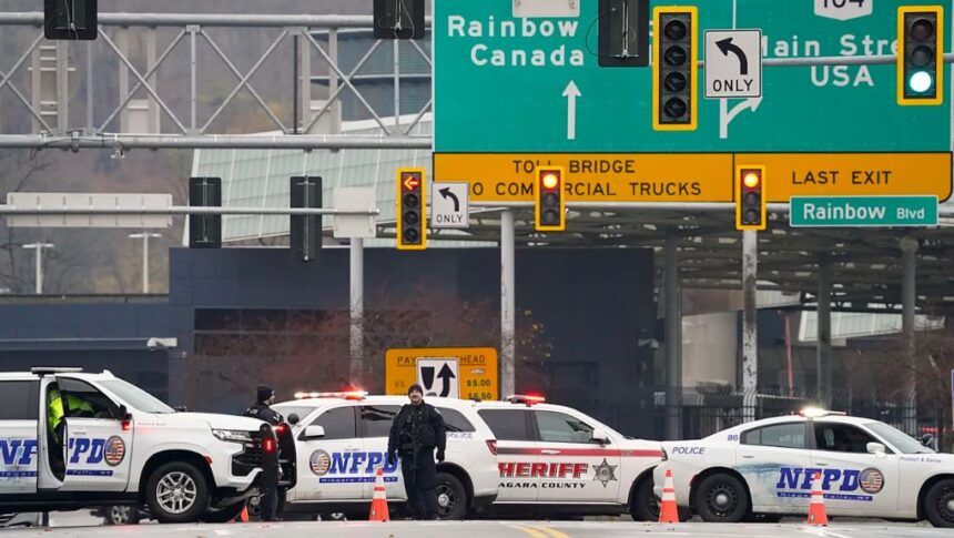 Law enforcement personnel blocked off the entrance to the Rainbow Bridge, on Wednesday in Niagara Falls, New York.