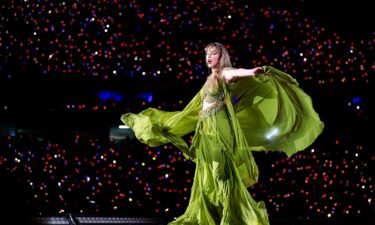 Fans of Taylor Swift queue outside the Nilton Santos Olympic Stadium before Swift's concert