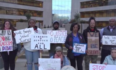 Members of the East St. Louis NAACP branch and other demonstrators gathered in solidarity for Jeremy Cureton who claims Brooklyn Police Chief Tom Jeffery used excessive force against him.