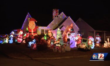 Decorating houses with lights and inflatable characters is a Christmas tradition for many families