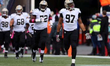 Defensive end Glenn Foster of the New Orleans Saints seen on the field before the start of the Saints and New England Patriots game at Gillette Stadium on October 13