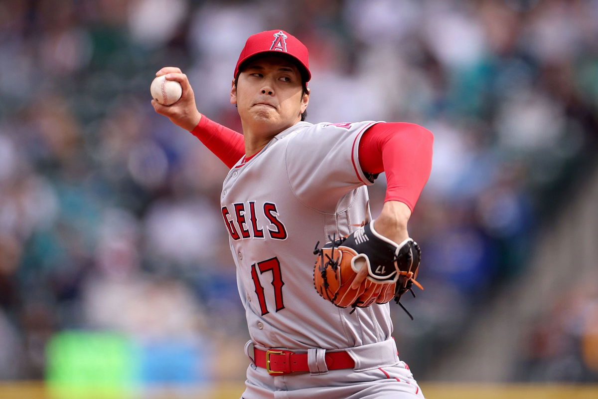 <i>Steph Chambers/Getty Images</i><br/>Ohtani pitches against the Seattle Mariners in April.