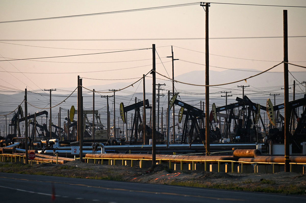 <i>Robyn Beck/AFP/Getty Images</i><br/>Pump jacks increase pressure to draw oil toward the surface at the South Belridge Oil Field in California in February 2022.