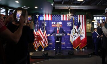 Former President Donald Trump speaks at a campaign event in Ankeny