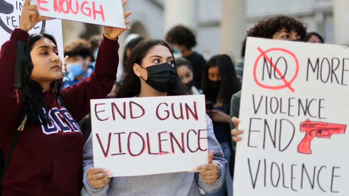 Students from Miguel Contreras Learning Complex high school in Los Angeles demonstrate in front of City Hall after walking out of school to protest gun violence in May 2022.