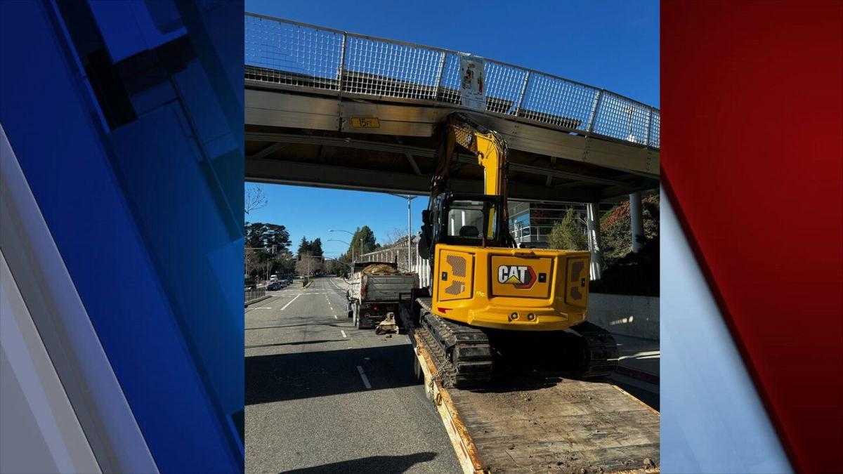 An excavator crashed into a pedestrian bridge on Soquel Avenue and Cabrillo College Road on Monday afternoon. 