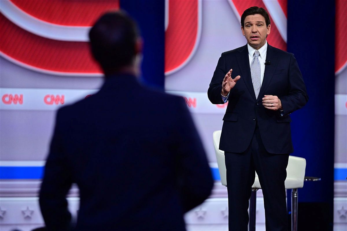 <i>Will Lanzoni/CNN</i><br/>Florida Gov. Ron DeSantis takes part in a CNN town hall at New England College in Henniker