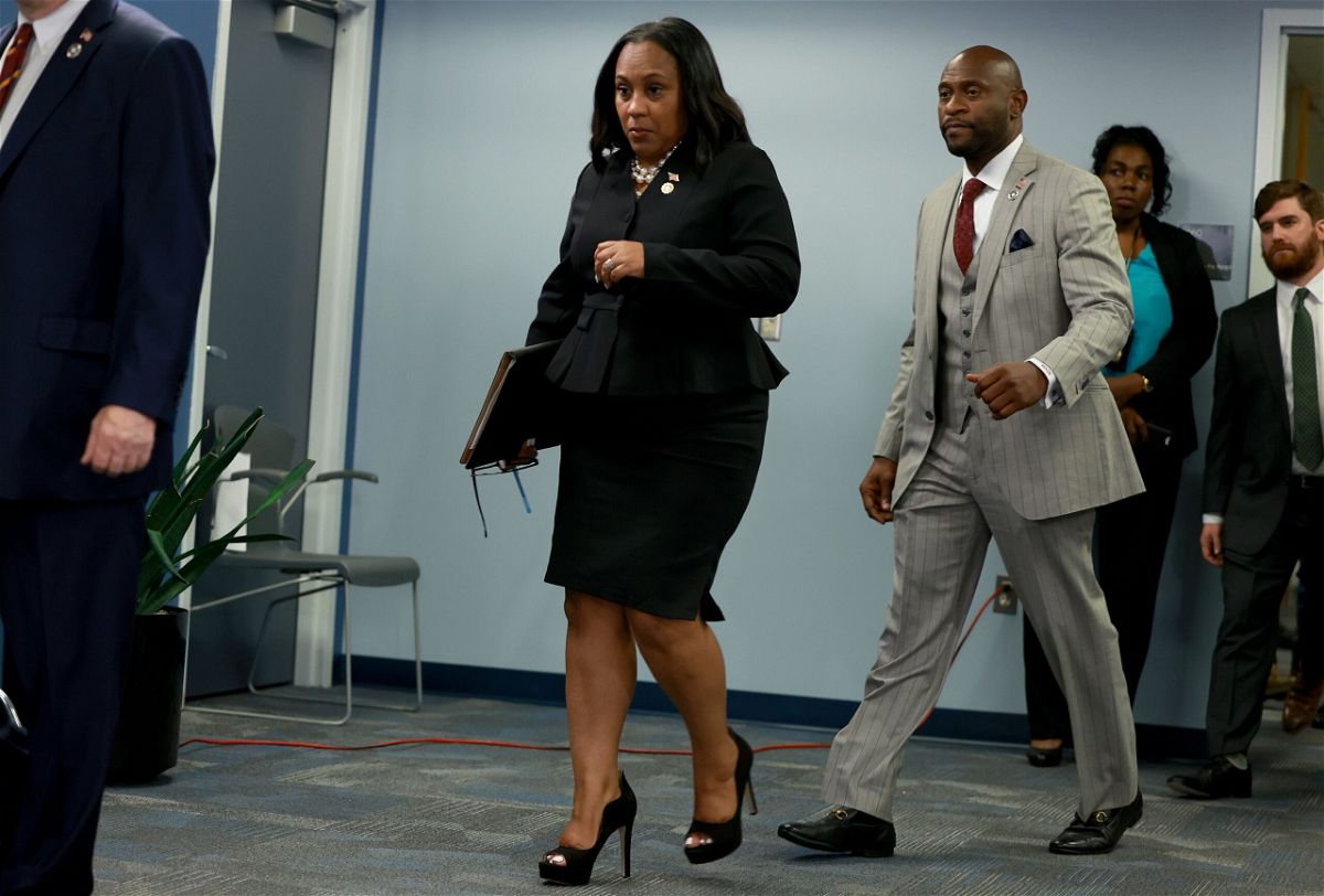 <i>Joe Raedle/Getty Images North America/Getty Images</i><br/>Fulton County District Attorney Fani Willis arrives to speak at a news conference at the Fulton County Government building on August 14