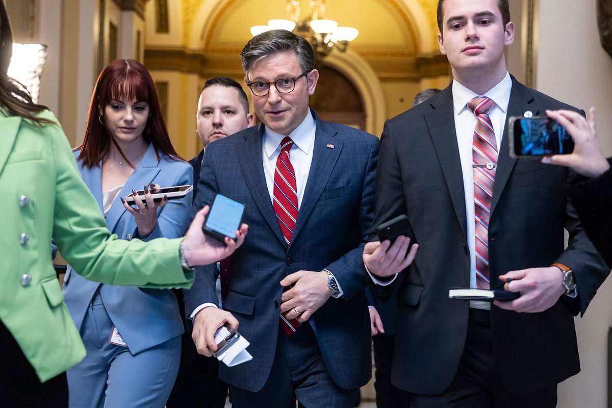 <i>Francis Chung/POLITICO/AP</i><br/>House Speaker Mike Johnson speaks with reporters at the US Capitol on January 29