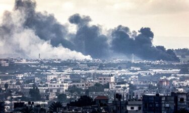 Smoke billows during Israeli bombardment on Khan Yunis from Rafah in the southern Gaza Strip early on January 3