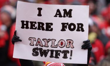 Taylor Swift celebrates with fans at the Dolphins-Chiefs football game in Kansas City in January.