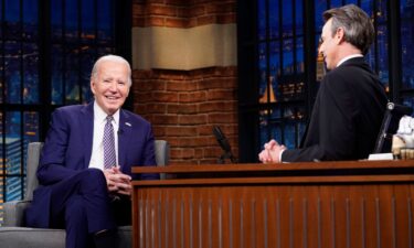 President Joe Biden talks with host Seth Meyers on February 26