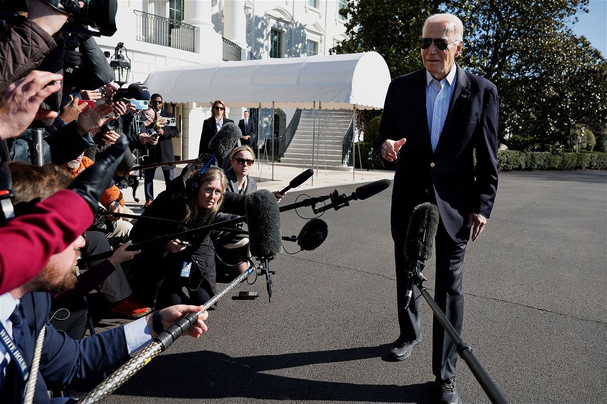 <i>Chip Somodevilla/Getty Images via CNN Newsource</i><br/>President Joe Biden speaks briefly with reporters before boarding the Marine One presidential helicopter and departing the White House on February 29 in Washington