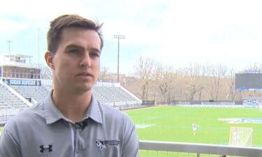 Friday night at Homewood Field both Johns Hopkins and Navy have players wearing a jersey number that honor a Navy graduate who lose his life in war.