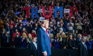 Former president Donald Trump delivers remarks at a campaign rally at the SNHU Arena in Manchester