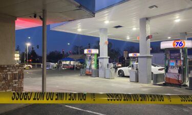 Police tape surrounds a gas station where a 2-year-old was killed in Woodland