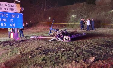 The mangled frame of an airplane lies at the scene of a crash near Nashville's Interstate 40 Monday night.