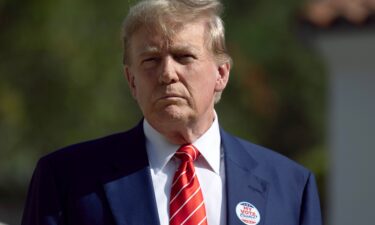 Former President Donald Trump speaks to the media after voting at a polling station setup in the Morton and Barbara Mandel Recreation Center on March 19