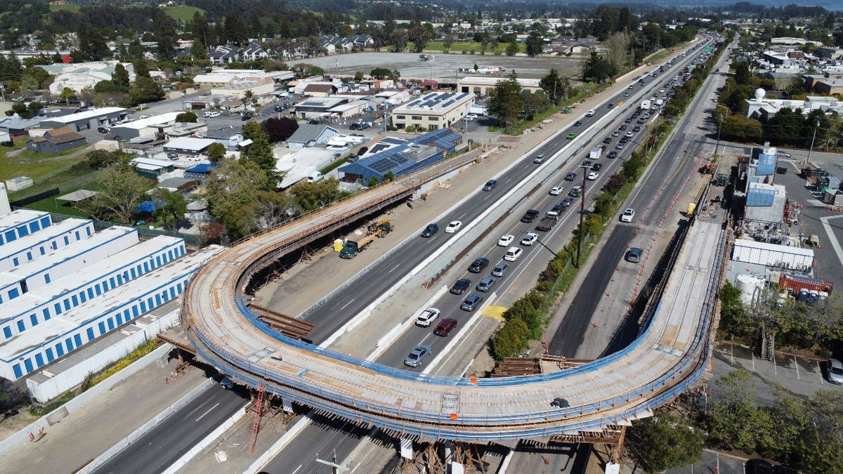 Overhead view of the pedestrian overcrossing bridge at Chanticleer Ave. and construction progress