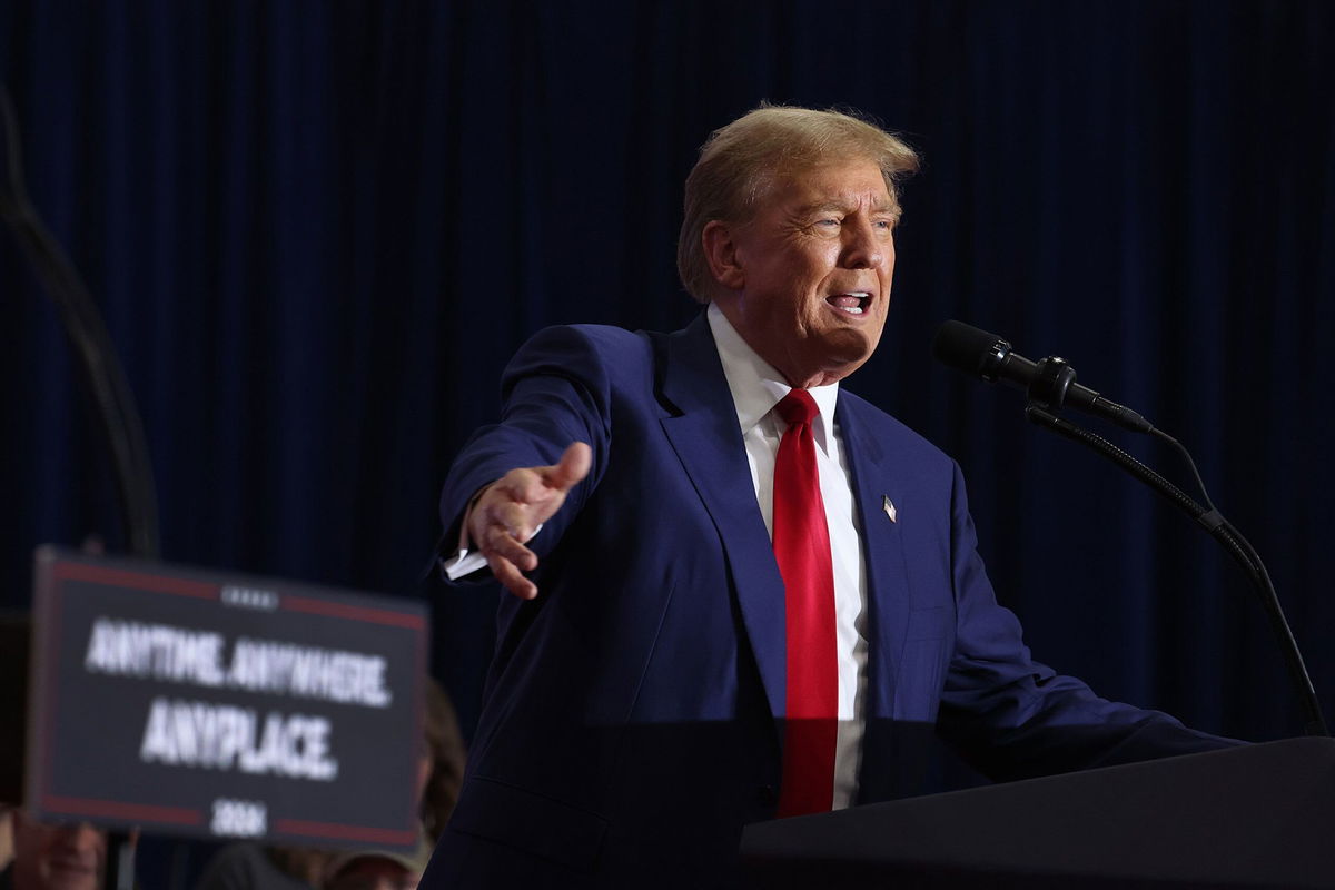 <i>Scott Olson/Getty Images via CNN Newsource</i><br/>Former President Donald Trump speaks to guests at a rally on April 2