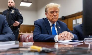 Former President Donald Trump awaits the start of proceedings during jury selection at Manhattan criminal court