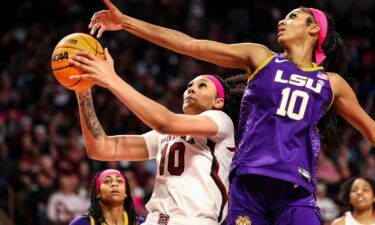 South Carolina Gamecocks center Kamilla Cardoso drives past LSU Lady Tigers forward Angel Reese in the first half at Colonial Life Arena on February 12