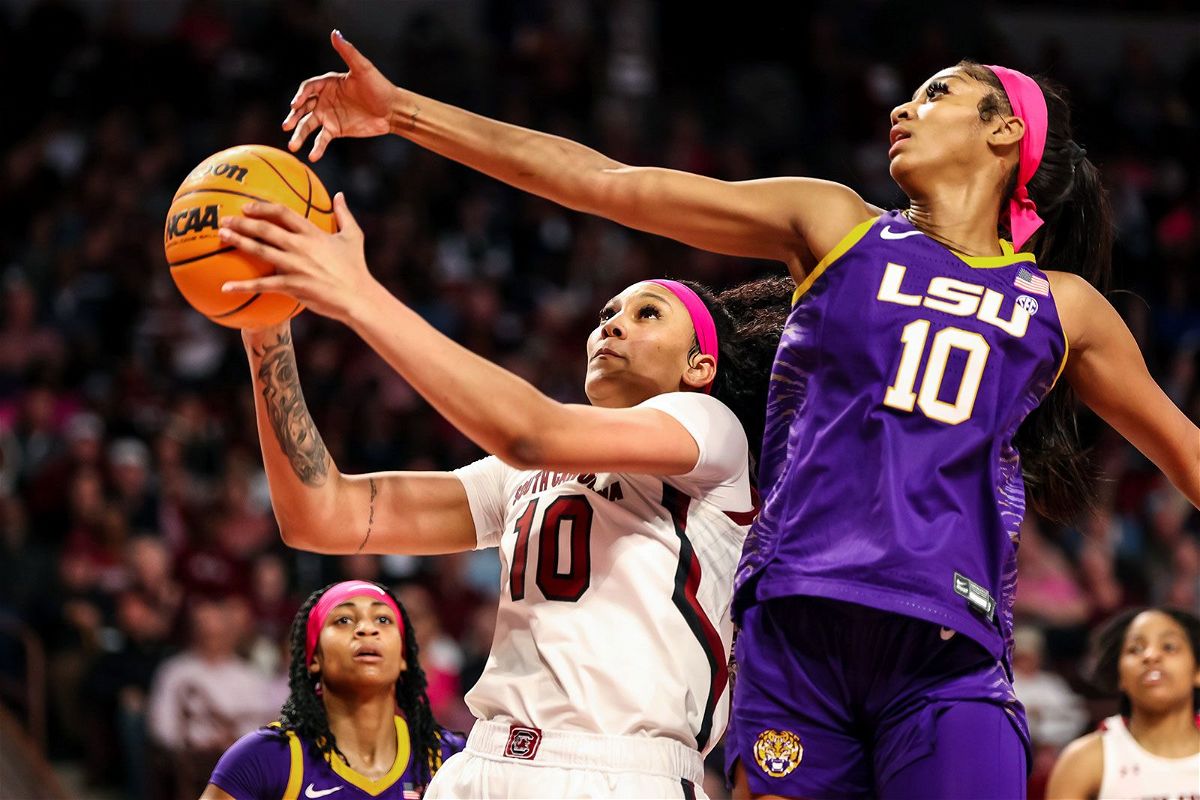 <i>Jeff Blake/USA Today Network via CNN Newsource</i><br/>South Carolina Gamecocks center Kamilla Cardoso drives past LSU Lady Tigers forward Angel Reese in the first half at Colonial Life Arena on February 12