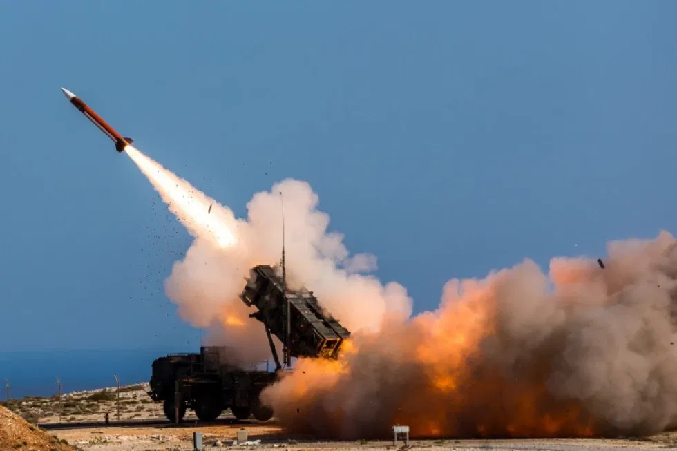 In this image released by the U.S. Department of Defense, German soldiers assigned to Surface Air and Missile Defense Wing 1, fire the Patriot weapons system at the NATO Missile Firing Installation, in Chania, Greece, on Nov. 8, 2017. U.S. officials say the Pentagon is expected to announce that it will provide about $6 billion in long-term military aid to Ukraine. It will include much sought after munitions for Patriot air defense systems and other weapons