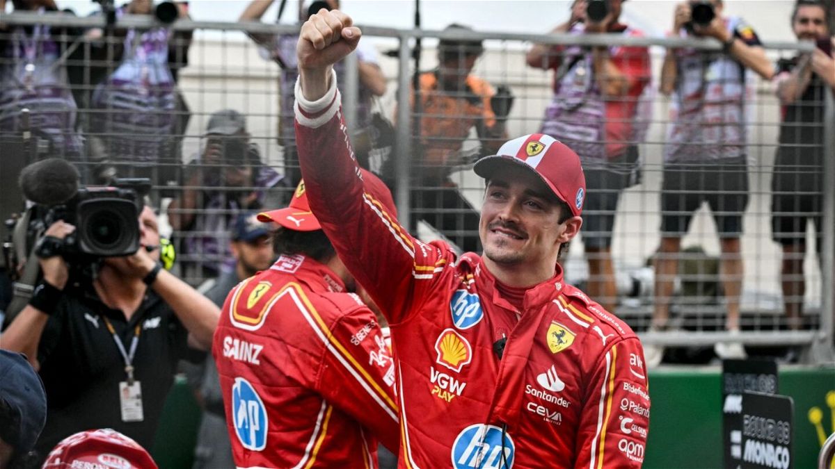Charles Leclerc celebrates after winning his home Monaco Grand Prix