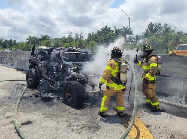 <i>West Palm Beach Police/WPBF via CNN Newsource</i><br/>A woman driving on I-95 jumped out of her burning car while it was still moving and survived