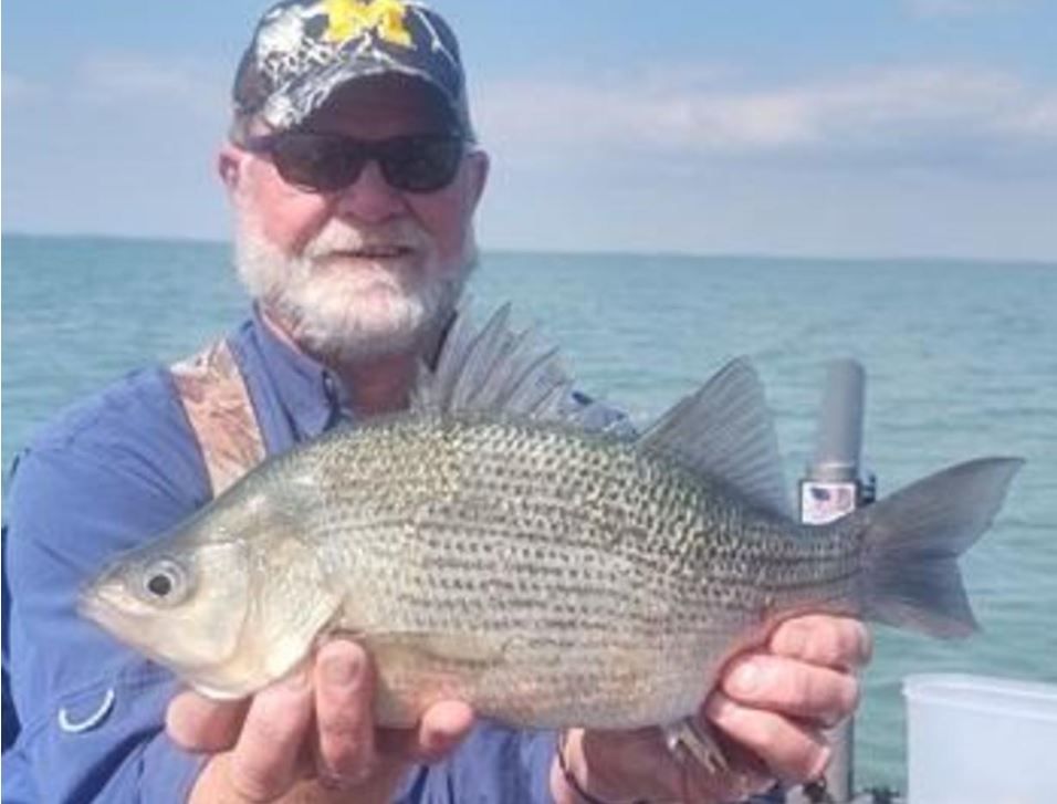 <i>MICHIGAN DEPARTMENT OF NATURAL RESOURCES/WWJ via CNN Newsource</i><br/>Scott Smith now holds a state record after catching what he called a 