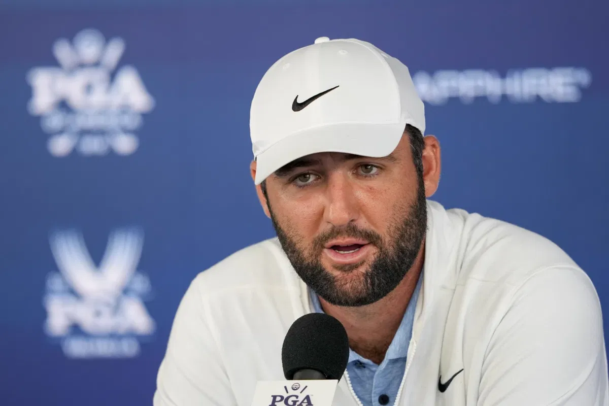 FILE- Scottie Scheffler speaks during a news conference at after the second round of the PGA Championship golf tournament. 