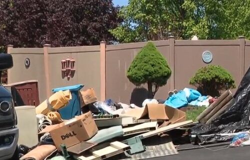 Neighbors in the Edgemede section of Plum said they have been battling to get piles of what they call junk and garbage strewn across their neighbor's property removed for two years.