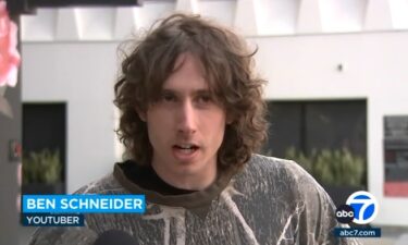 A daredevil was captured on video performing a dangerous stunt at the site of the graffitied skyscrapers in downtown Los Angeles. Ben Schneider