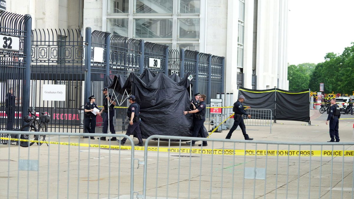 <i>Doral Chenoweth/Columbus Dispatch/USA Today Network via CNN Newsource</i><br/>Ohio State University police cordoned off an area outside Ohio Stadium after someone fell from the stands and died during a graduation ceremony on May 5.