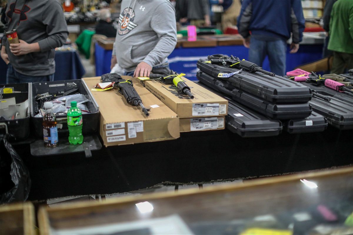 <i>Kimberly P. Mitchell/Detroit Free Press/USA Today Network via CNN Newsource</i><br/>People browse guns for sal