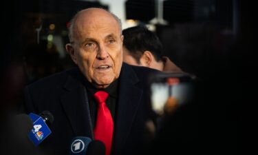 Rudy Giuliani speaks to members of the media where Republican candidate Florida Gov. Ron DeSantis was scheduled to host a campaign event on January 21