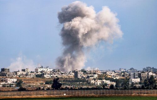 A smoke plume from an explosion in Gaza as seen from a position along Israel's southern border with the Palestinian enclave on May 13.