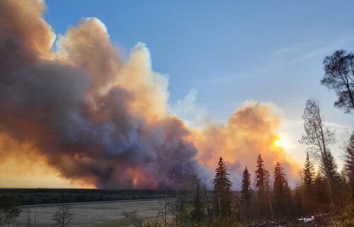 Smoke rises from a wildfire burning near Fort Nelson on May 14.