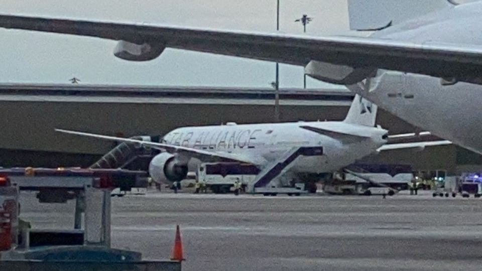 A Singapore airline aircraft is seen on tarmac after requesting an emergency landing at Bangkok's Suvarnabhumi International Airport, Thailand, on May 21.