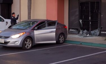 The front door to a Miramar gun shop was smashed