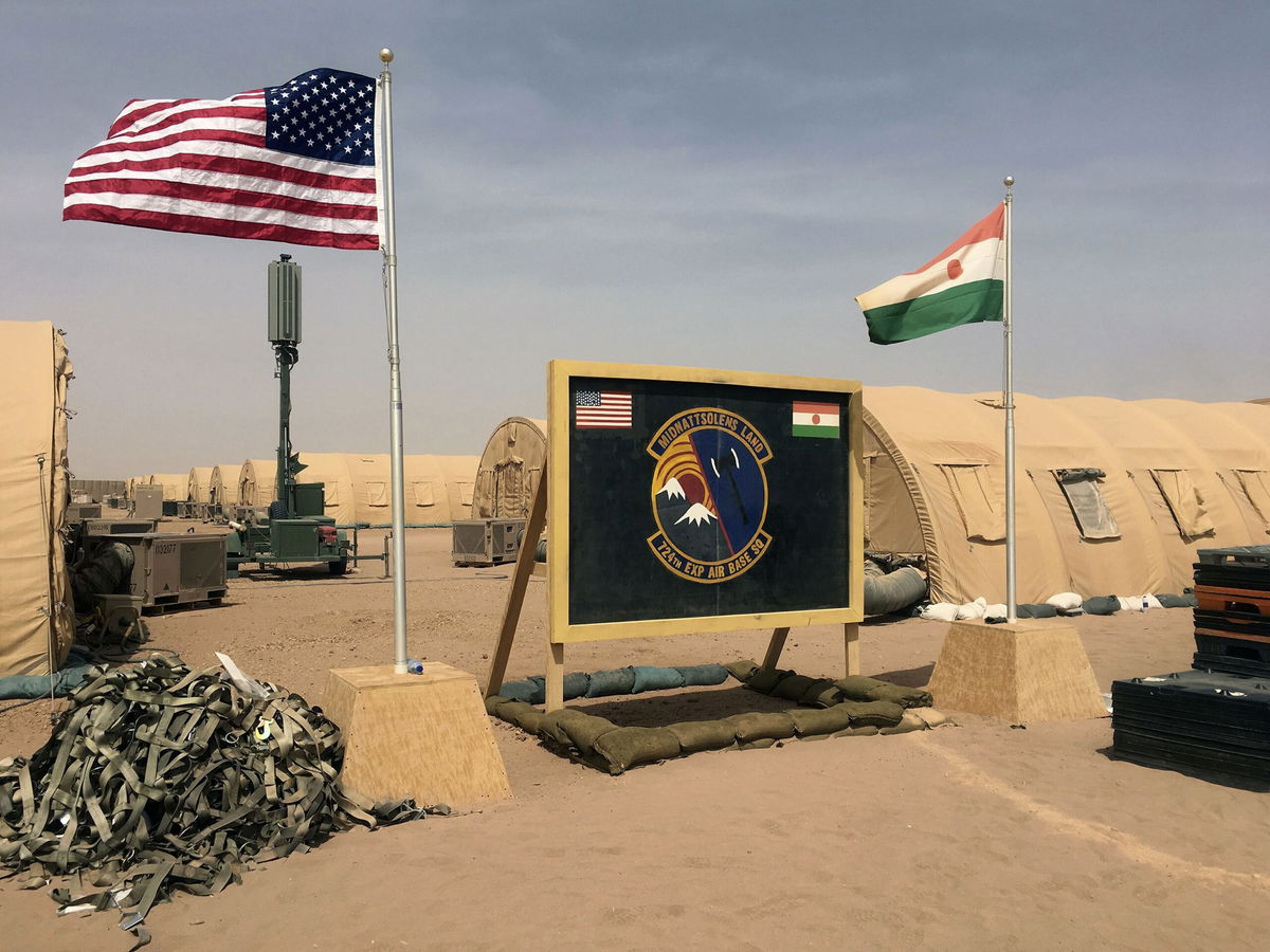 <i>Carley Petesch/AP/File via CNN Newsource</i><br/>The flags of the United States and of Niger are raised side by side at the base camp for air forces and other personnel supporting the construction of Niger Air Base 201 in Agadez in April 2018.