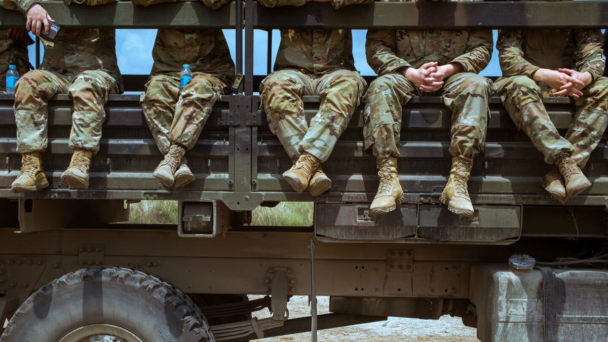 <i>Jes Aznar/Getty Images via CNN Newsource</i><br />United States soldiers take a break as they prepare for a live fire drill to be presented to members of the media in April 2023 in San Antonio