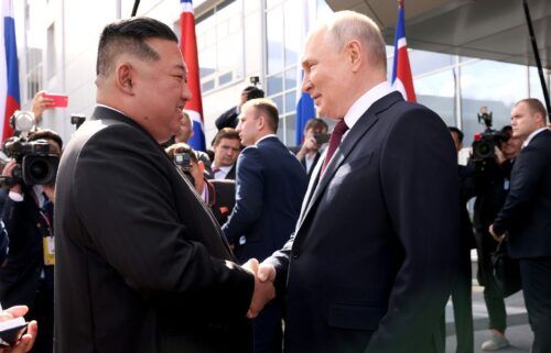 Russian President Vladimir Putin greets North Korean leader Kim Jong Un ahead of their tour of the Vostochny Cosmodrome space launch center in Russia's Amur region in September 2023.