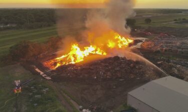 Crews continued battling a large fire at a recycling facility in Park City on Monday.