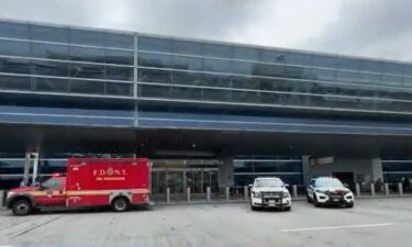 Nine people suffered minor injuries and dozens of flights were impacted after a small fire broke out at JFK Airport on July 24.