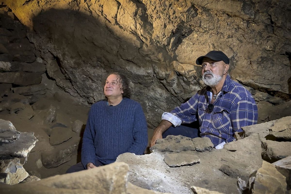 <i>Courtesy of Jess Shapiro for GLaWAC via CNN Newsource</i><br/>Professor Bruno David (L) and Uncle Russell Mullett (R) pictured in the cave.